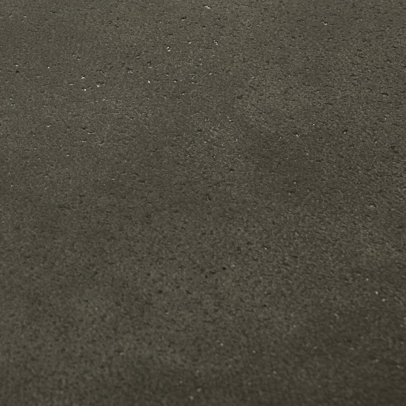 Dark grey fibre cement with pitted finish