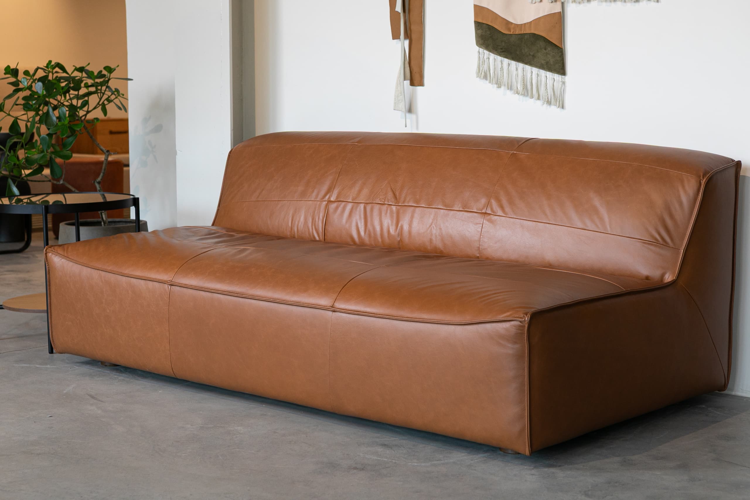 The Crest Sofa from Mansa Furniture upholstered in Aniline Buffalo leather